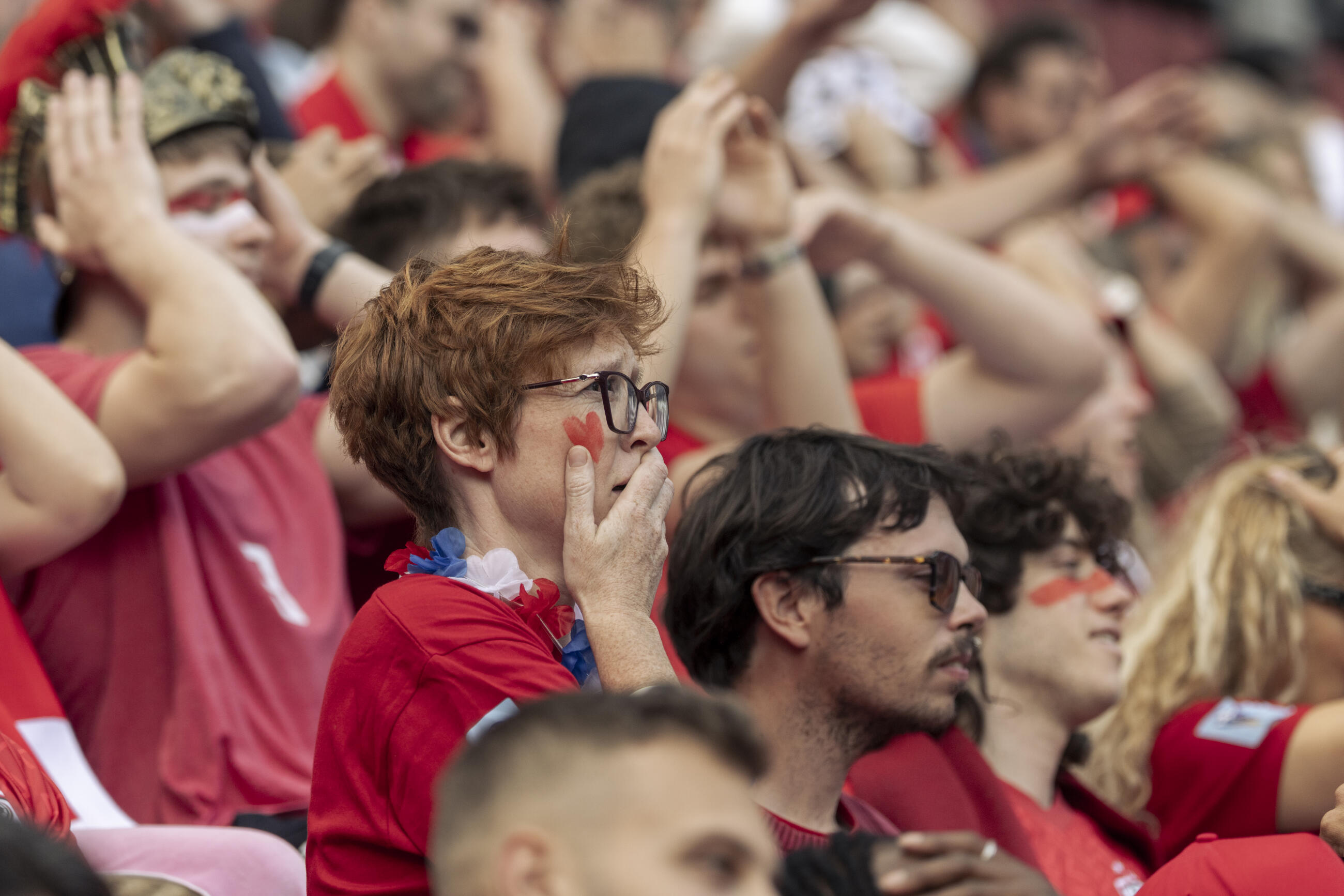 Soccer Enthusiasts React with Disappointment in Stadium