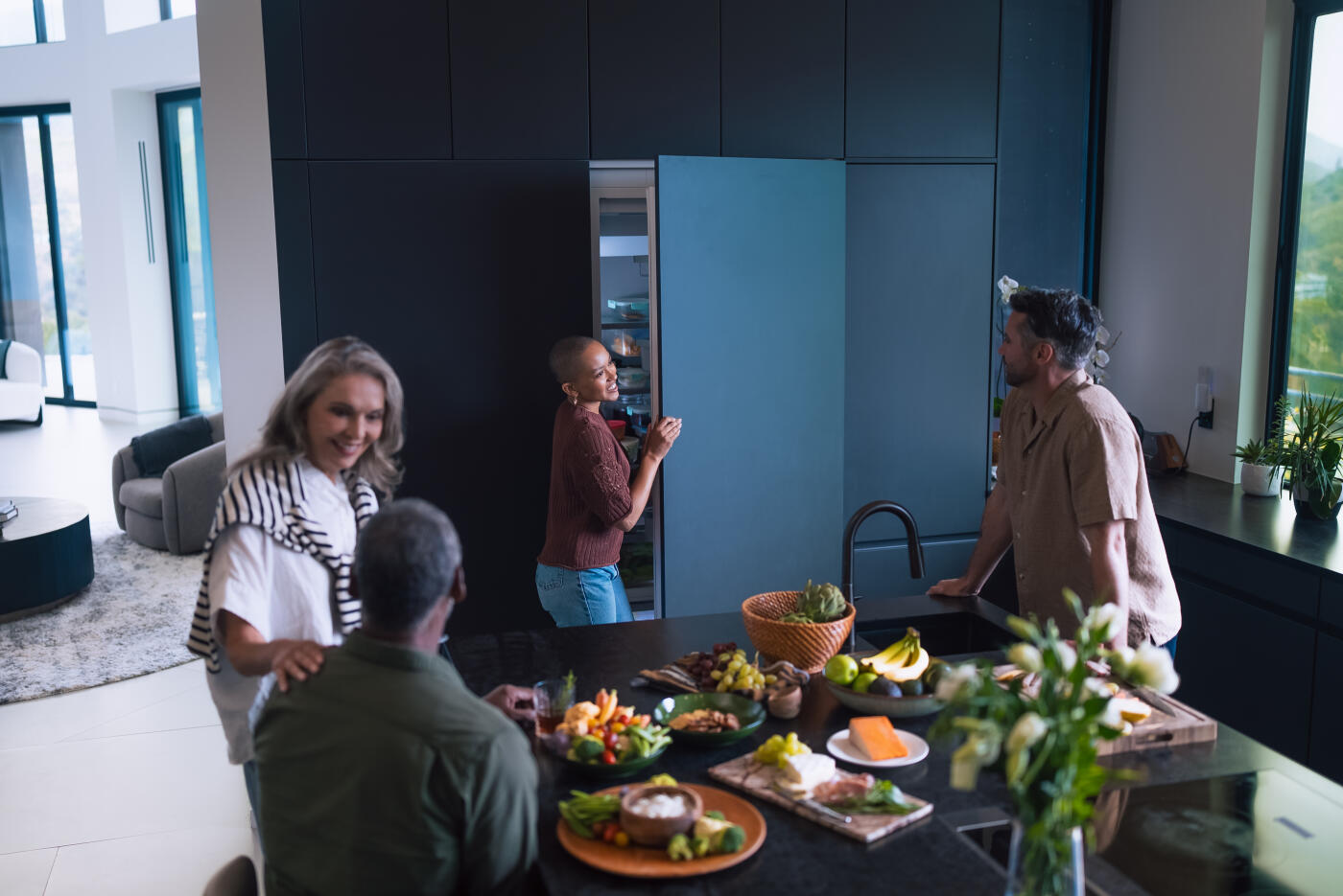 A sophisticated multi-generational family enjoys an elegant dining experience inside a luxurious modern home. Parents, in-laws, and a young married couple gather around a designer kitchen island adorned with vibrant gourmet dishes, fresh ingredients, and premium table settings. Natural light pours through expansive windows, highlighting the upscale architecture, high-end finishes, and warm family connection. The scene captures luxury living, family togetherness, fine dining, and meaningful conversation in an affluent residential setting.