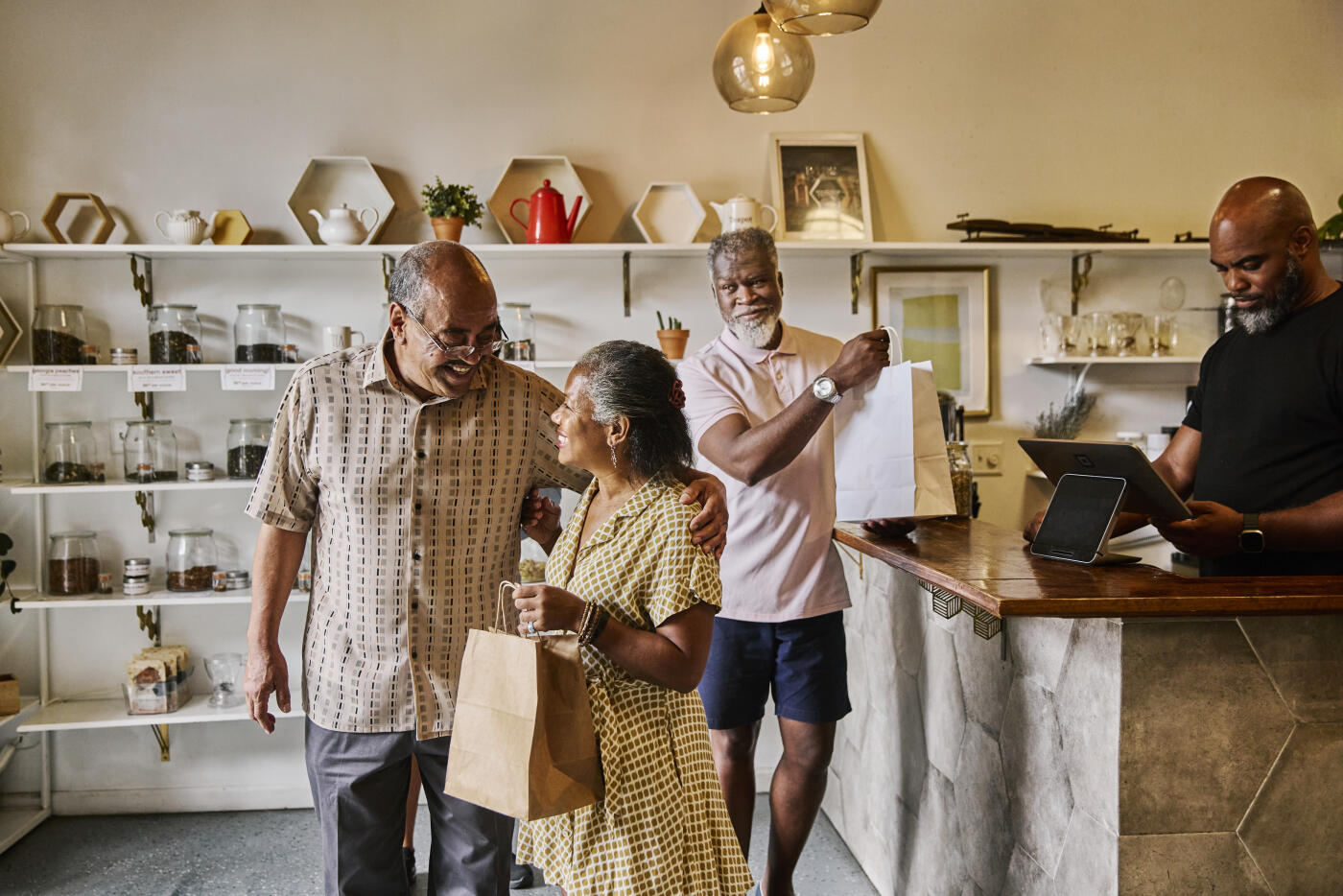 Satisfied customers exiting a retail establishment following a purchase.