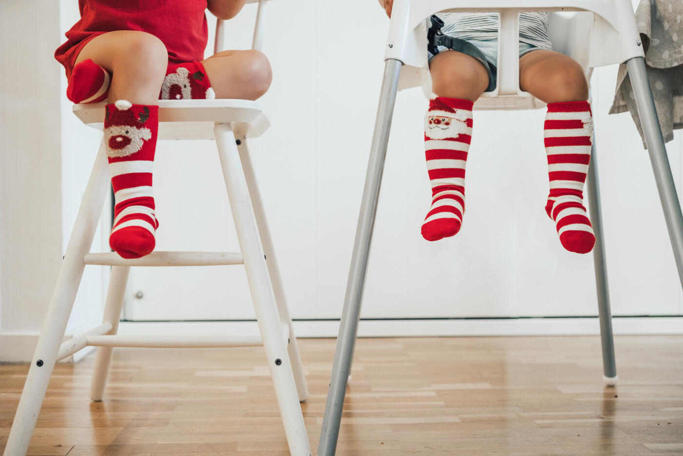 Brothers wearing christmas socks