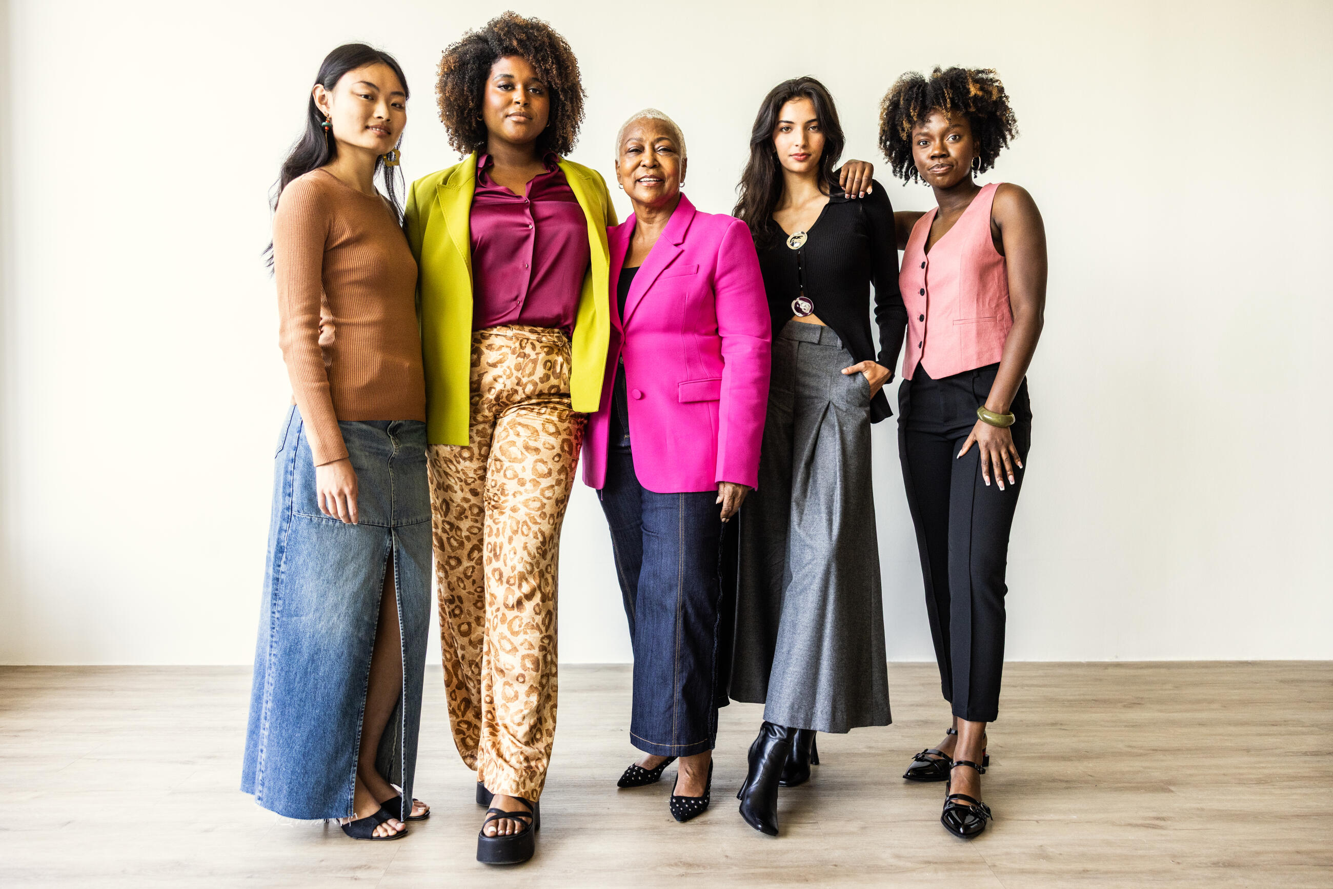 Portrait of beautiful and fashionable women on white background