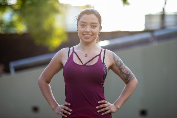 Portrait of female Latin athlete outdoors