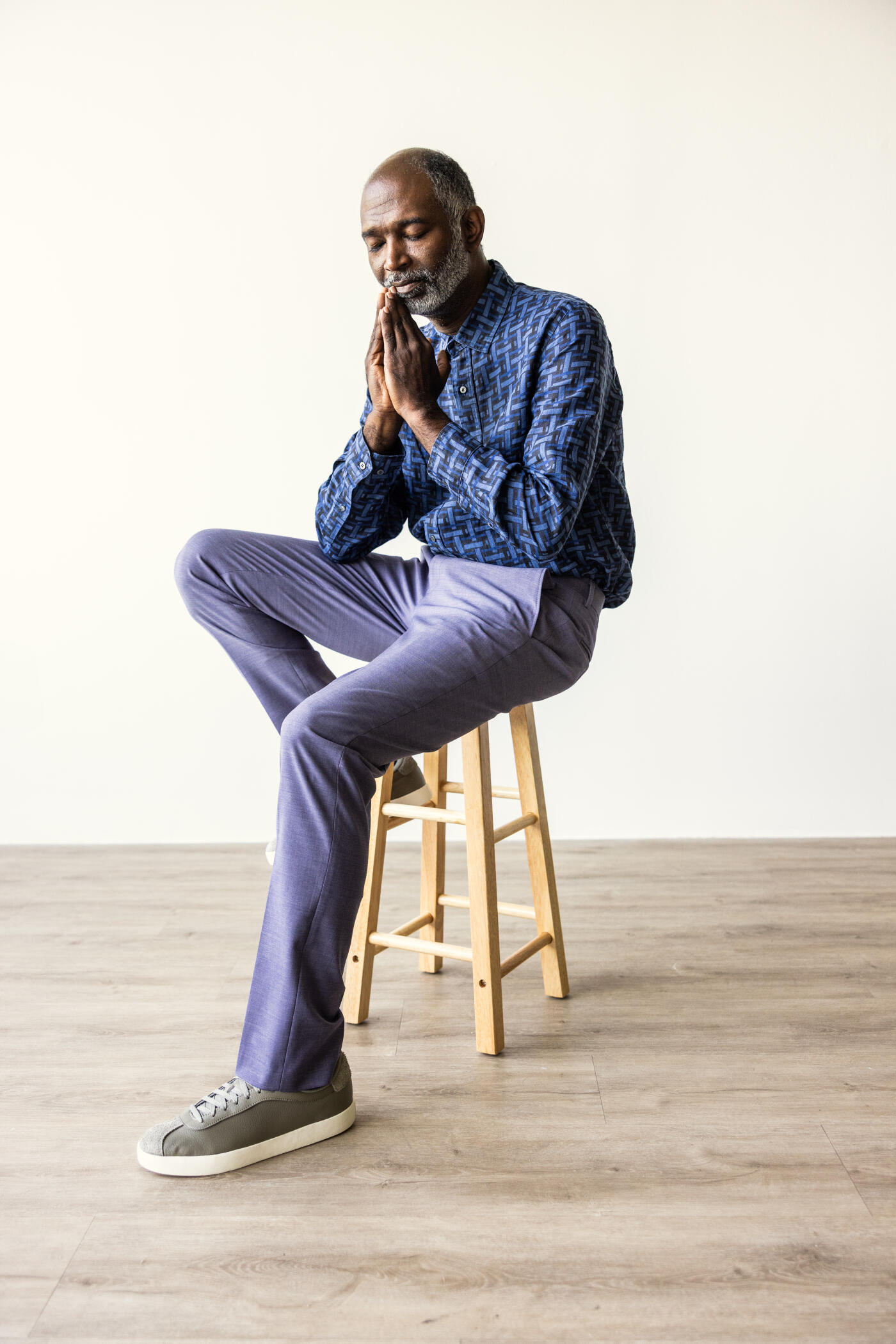 Portrait of senior man white gray hair on white background