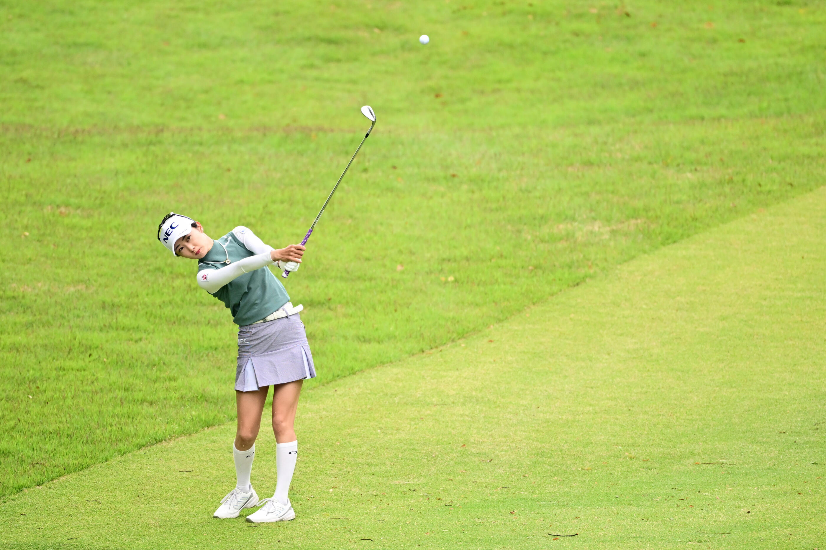 KIKUYO, JAPAN - APRIL 17: Yuka Yasuda of Japan hits her third shot on the 1st hole during the first round of KKTcup VANTELIN Ladies Open at Kumamoto Kuko Country Club on April 17, 2026 in Kikuyo, Kumamoto, Japan. (Photo by Atsushi Tomura/Getty Images)