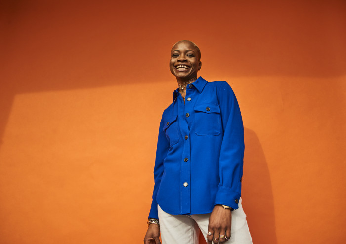 Colourful studio portrait of a young woman