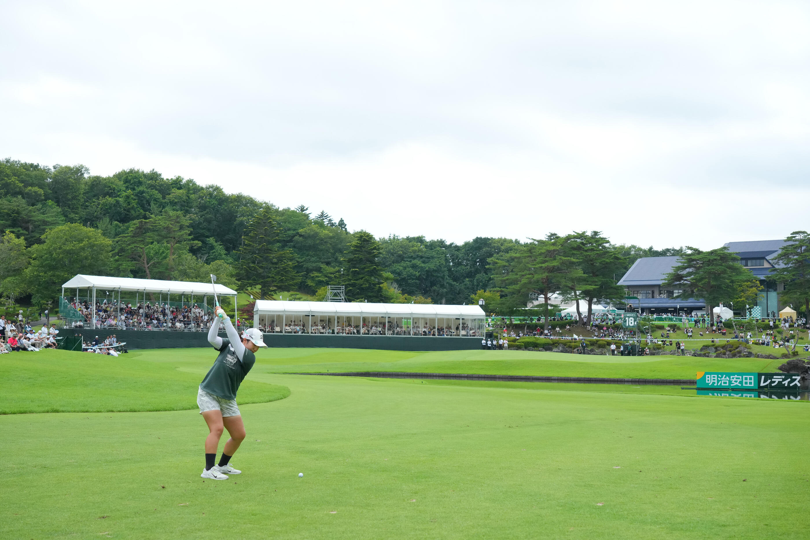 TOMIYA, JAPAN - JULY 19: Miyuu Abe of Japan hits her second shot on the 18th hole during the final round of MEIJIYASUDA LADIES GOLF TOURNAMENT at Sendai Classic Golf Club on July 19, 2026 in Tomiya, Miyagi, Japan. (Photo by Yoshimasa Nakano/JLPGA via Getty Images)