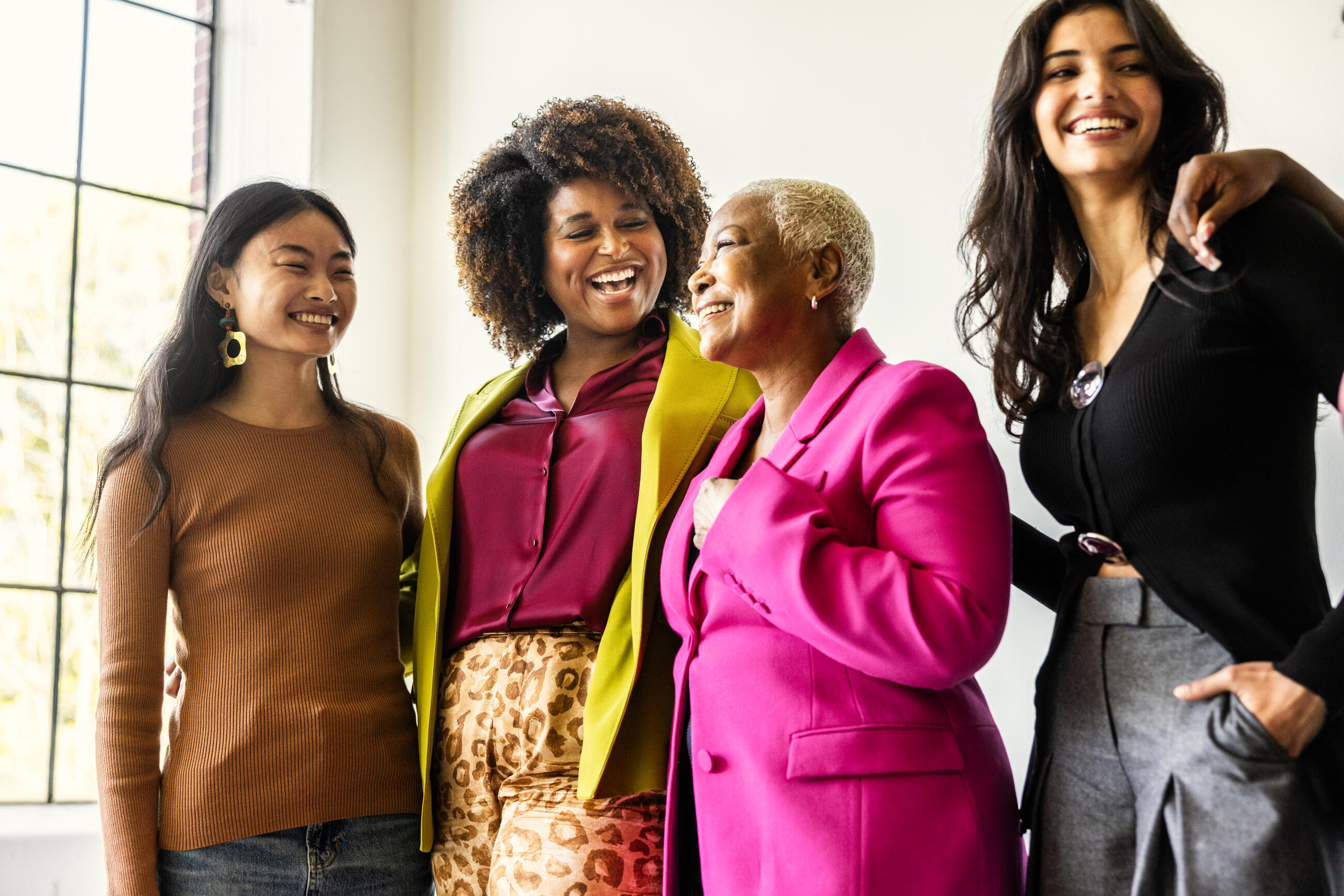 Portrait of beautiful and fashionable women on white background