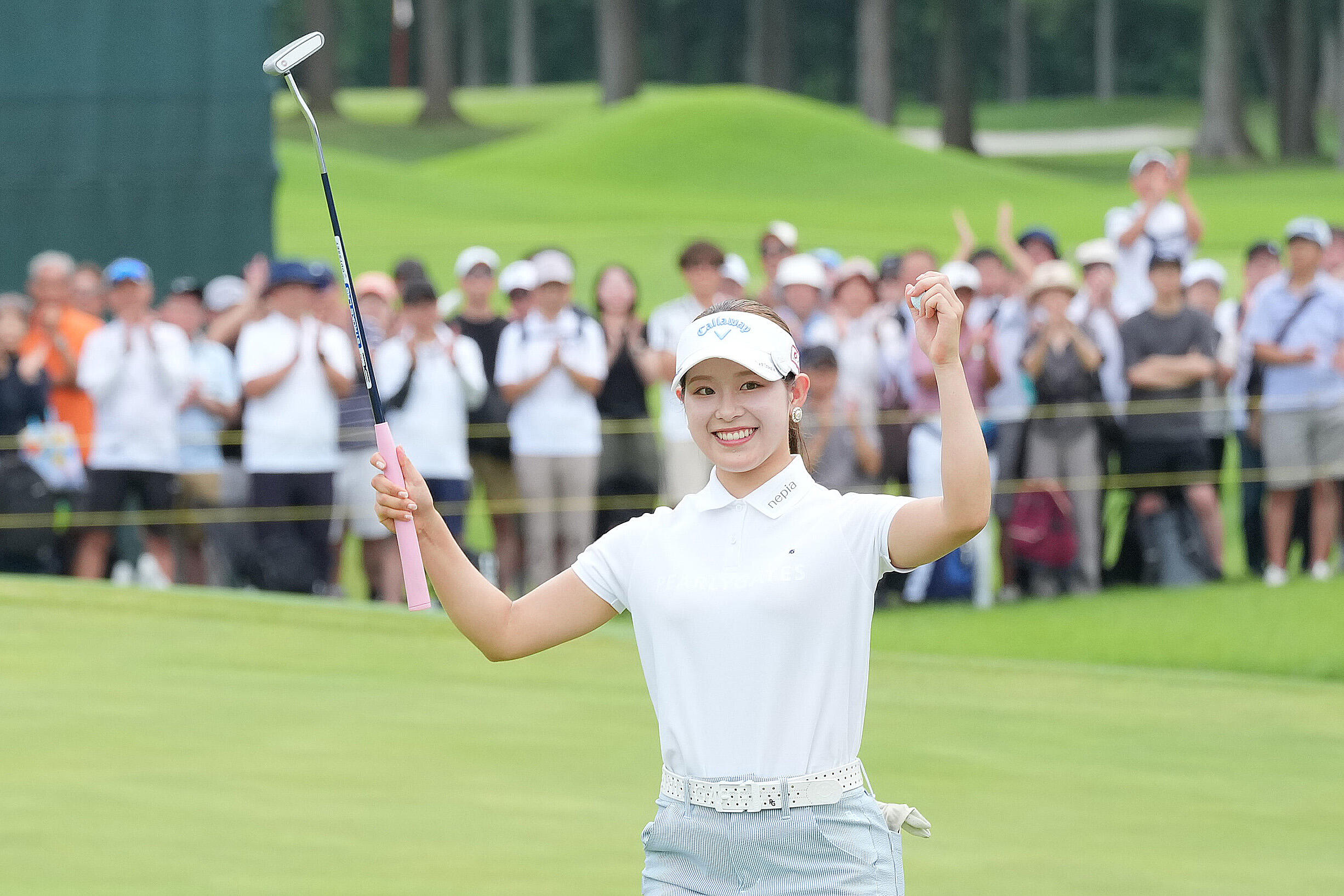 HAKONE, JAPAN - AUGUST 23: Rin Yoshida of Japan celebrates winning the tournament on the 18th green during the final round of CAT Ladies 2026 at Daihakone Country Club on August 23, 2026 in Hakone, Kanagawa, Japan. (Photo by Yoshimasa Nakano/Getty Images)