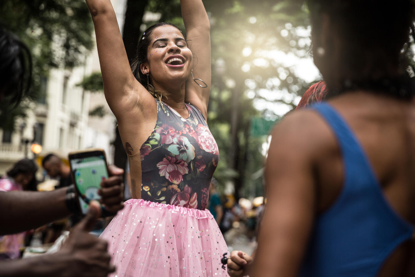 People having fun in the street carnival party