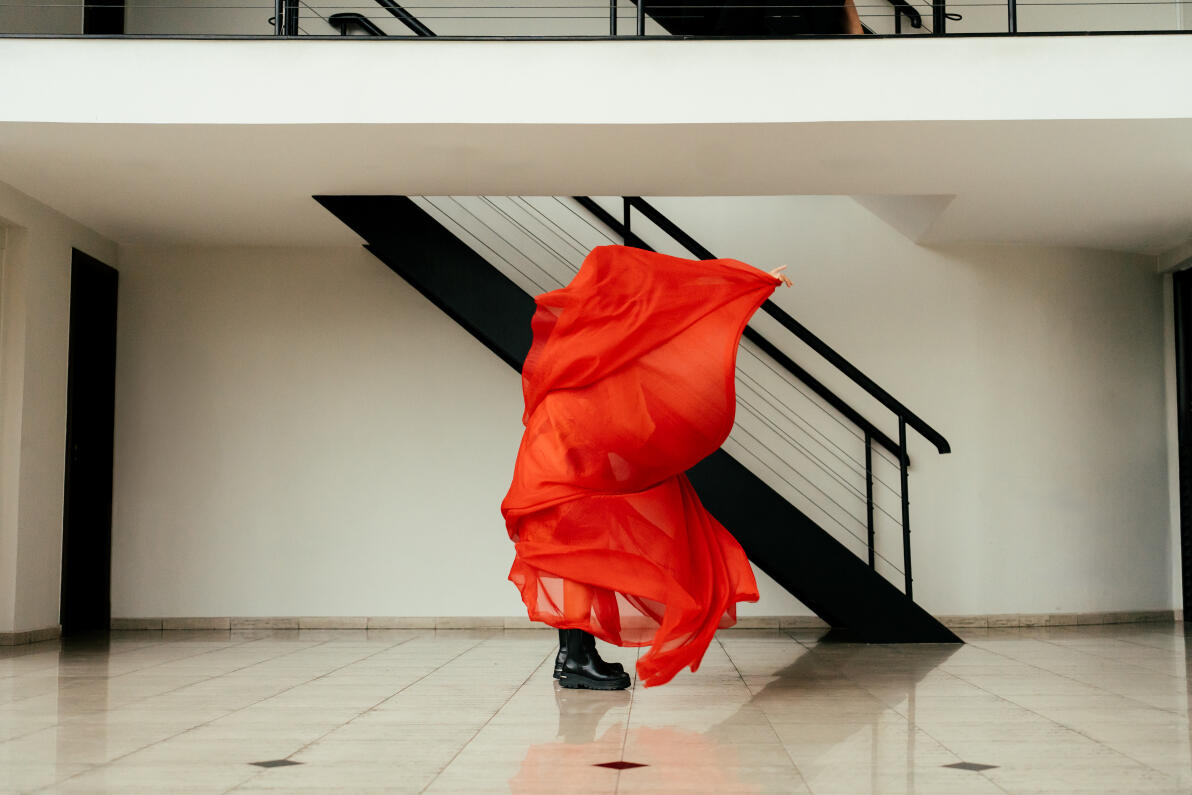 Conceptual images of dancers dancing with fabrics