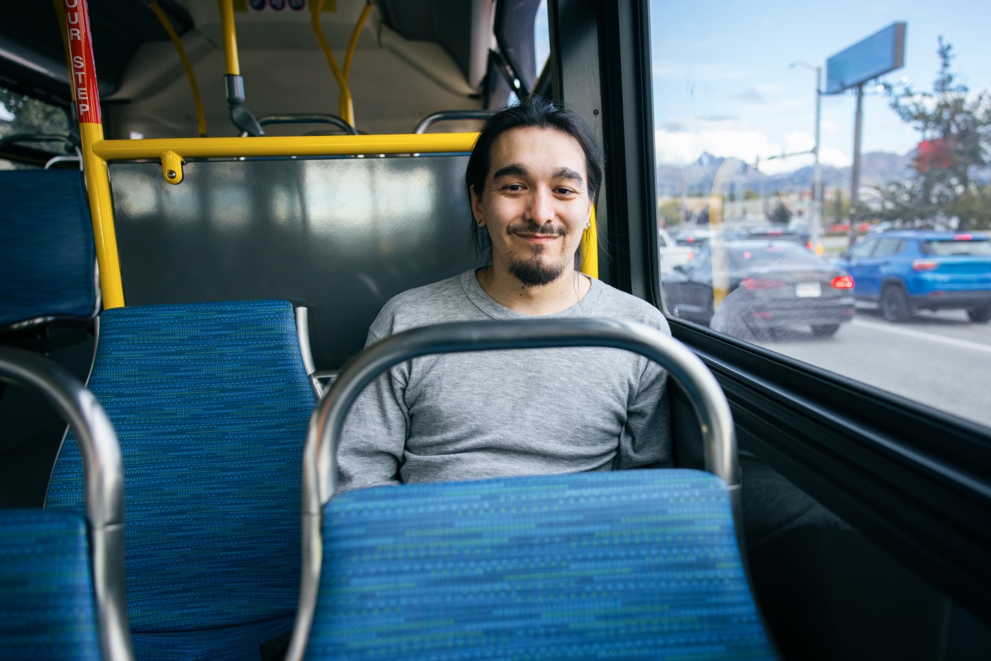 An Indigenous Alaskan man (Yupik tribe) takes the bus in the city of Anchorage, Alaska, USA.