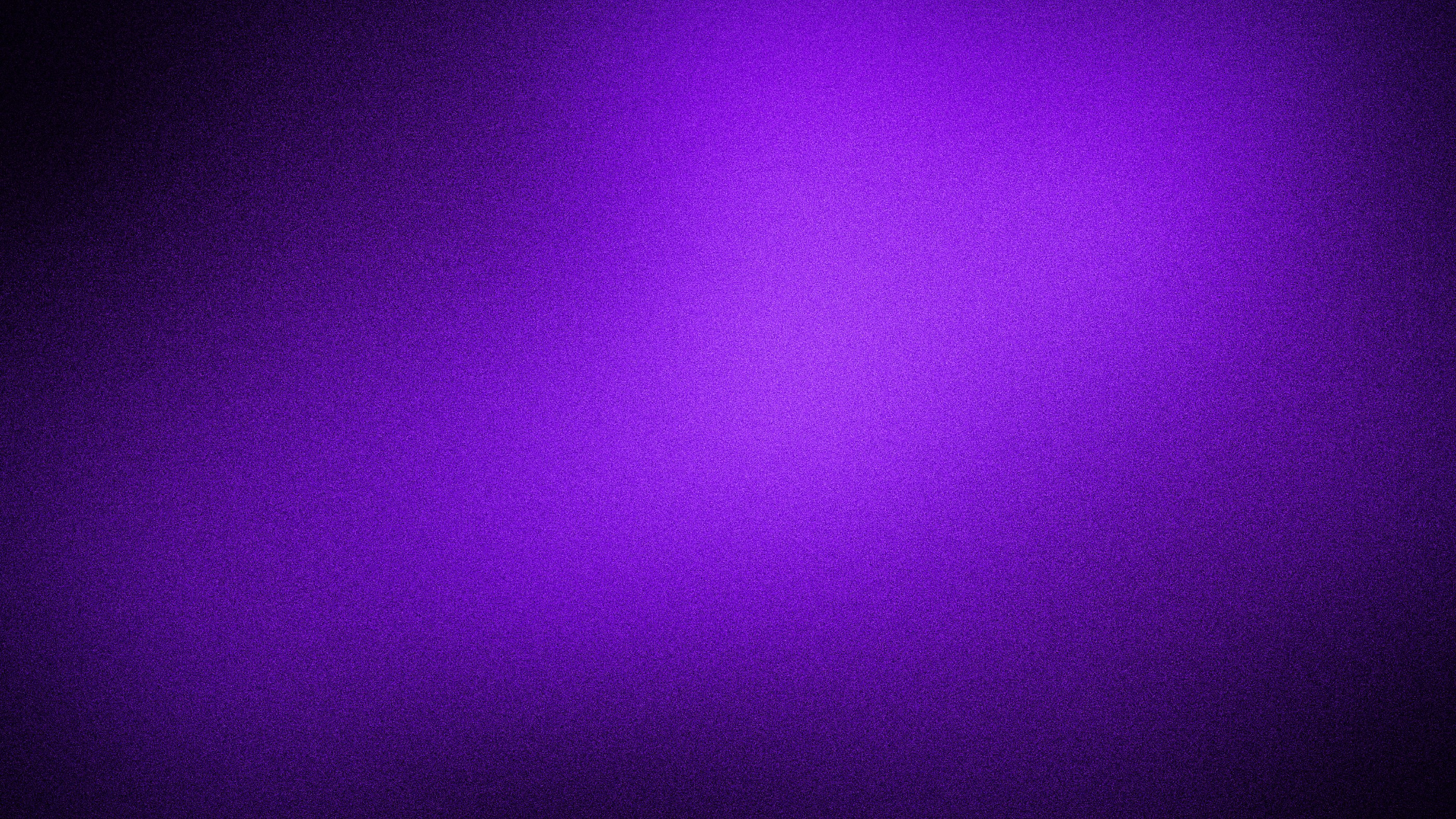 A vibrant 4K grainy purple gradient background, ideal for wallpapers, banners, and digital designs. The soft blur effect and textured backdrop create a dynamic and captivating visual experience
