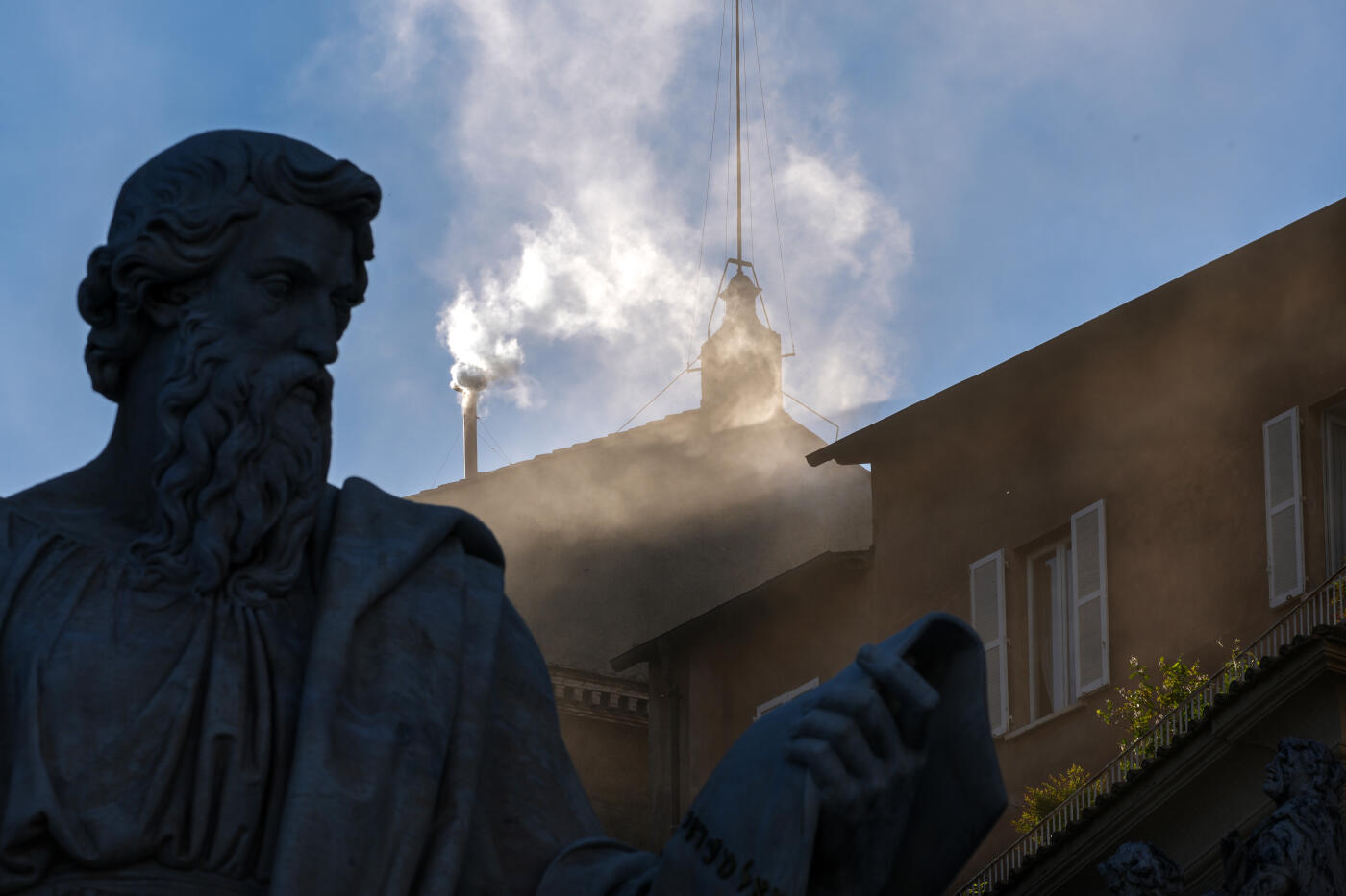 VATICAN CITY, VATICAN - MAY 08:  White smoke rises from the chimney on the roof of the Sistine Chapel indicating that the College of Cardinals have elected a new Pope during their fourth vote on the second day of their secret conclave on May 8, 2025 in Vatican City, Vatican. White smoke was seen over the Vatican early this evening as the Conclave of Cardinals took just two days to elect Cardinal Robert Francis Prevost, who will be known as Pope Leo (Leone) XIV, as the 267th Supreme Pontiff after the death of Pope Francis on Easter Monday. (Photo by Christopher Furlong/Getty Images)