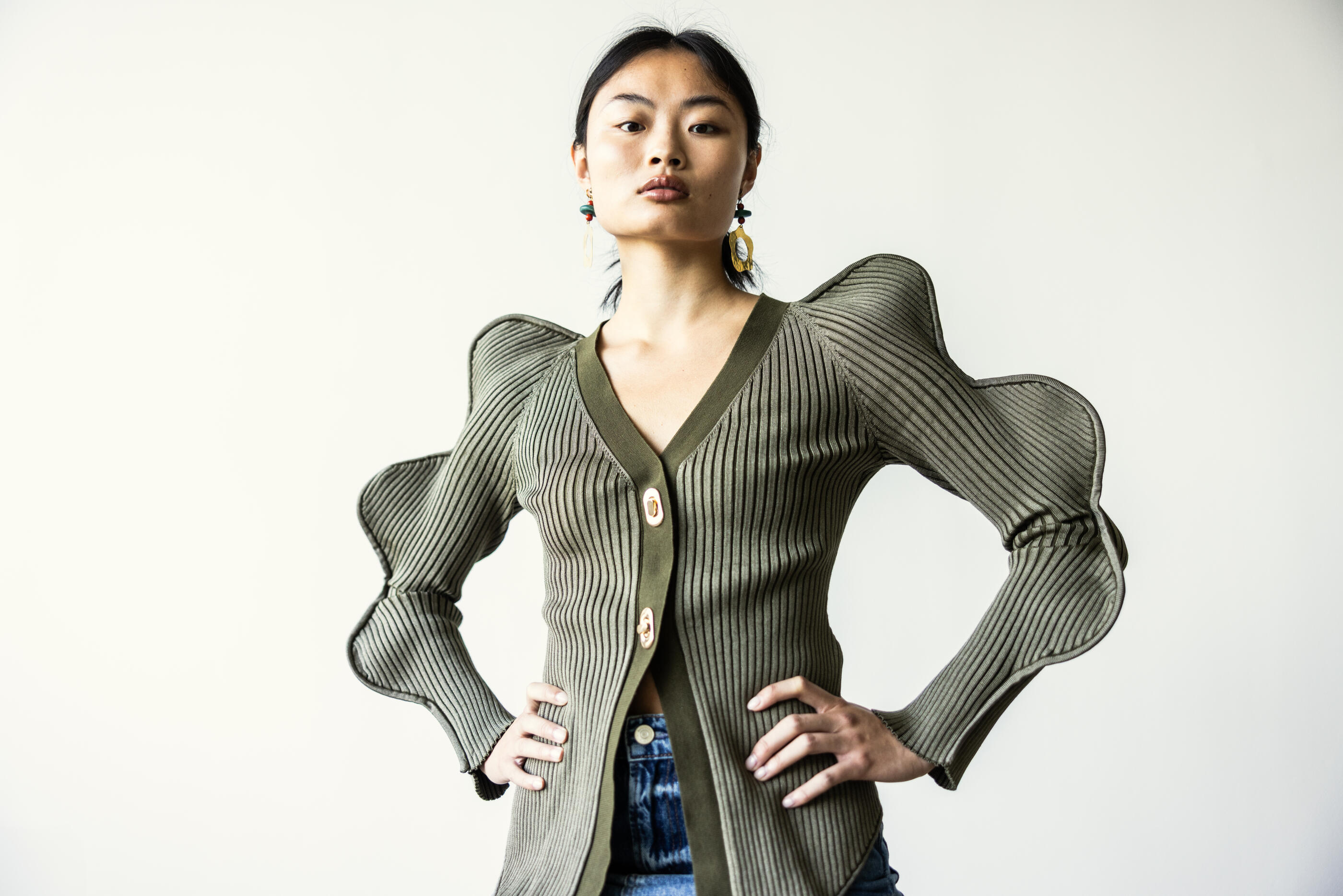 Portrait of beautiful young woman on white background