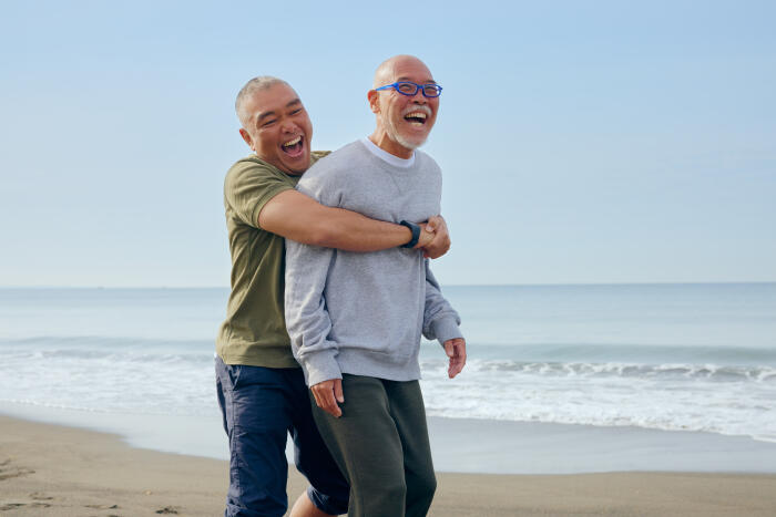 Marine sports friends against Pacific Ocean