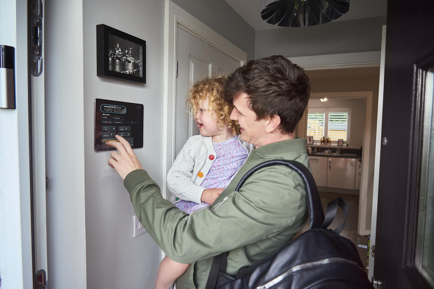 Settings the smart home hub on the way out for the day