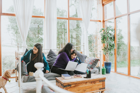 Daughters homeschool on either side of their Working Mum