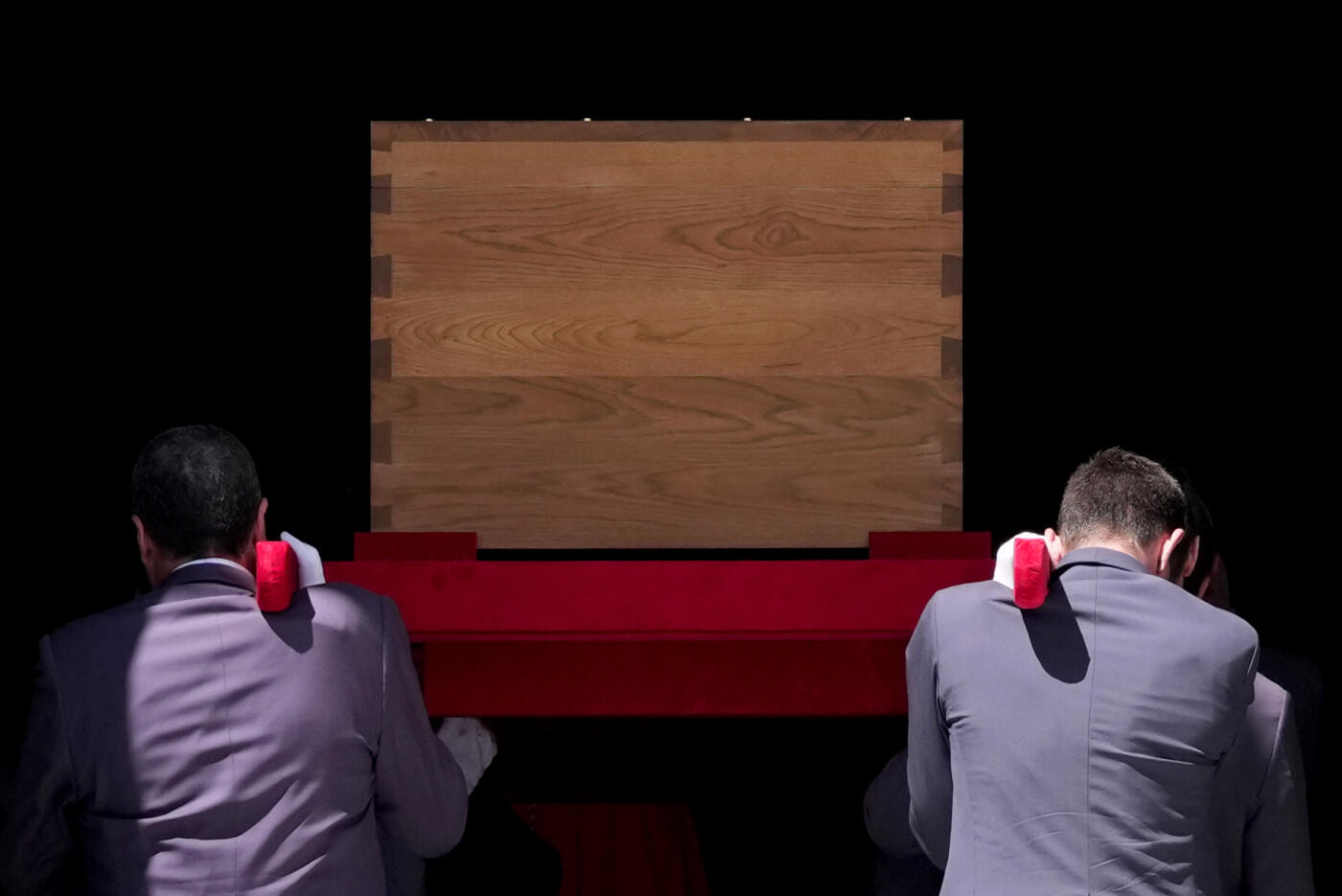 ROME, ITALY - APRIL 26: The coffin of Pope Francis is carried by pallbearers into the Basilica Santa Maria Maggiore on April 26, 2025 in Rome, Italy. Pope Francis died on April 21st, aged 88. Anointed in 2013, Argentinian Jorge Mario Bergoglio was the first Latin American and Jesuit Pope. Taking the name Francis after St Francis of Assisi, he was a more humble Pope than many of his predecessors and will be buried outside of the Vatican in a simple wooden coffin at the Basilica Santa Maria Maggiore. (Photo by Christopher Furlong/Getty Images)