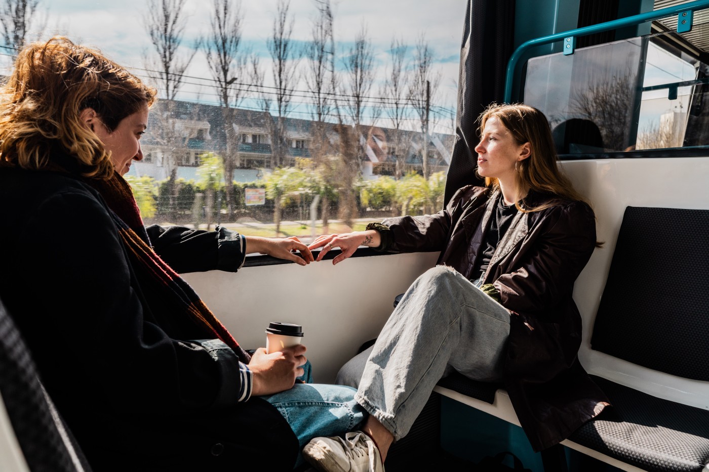 Lesbian tourist couple during train journey