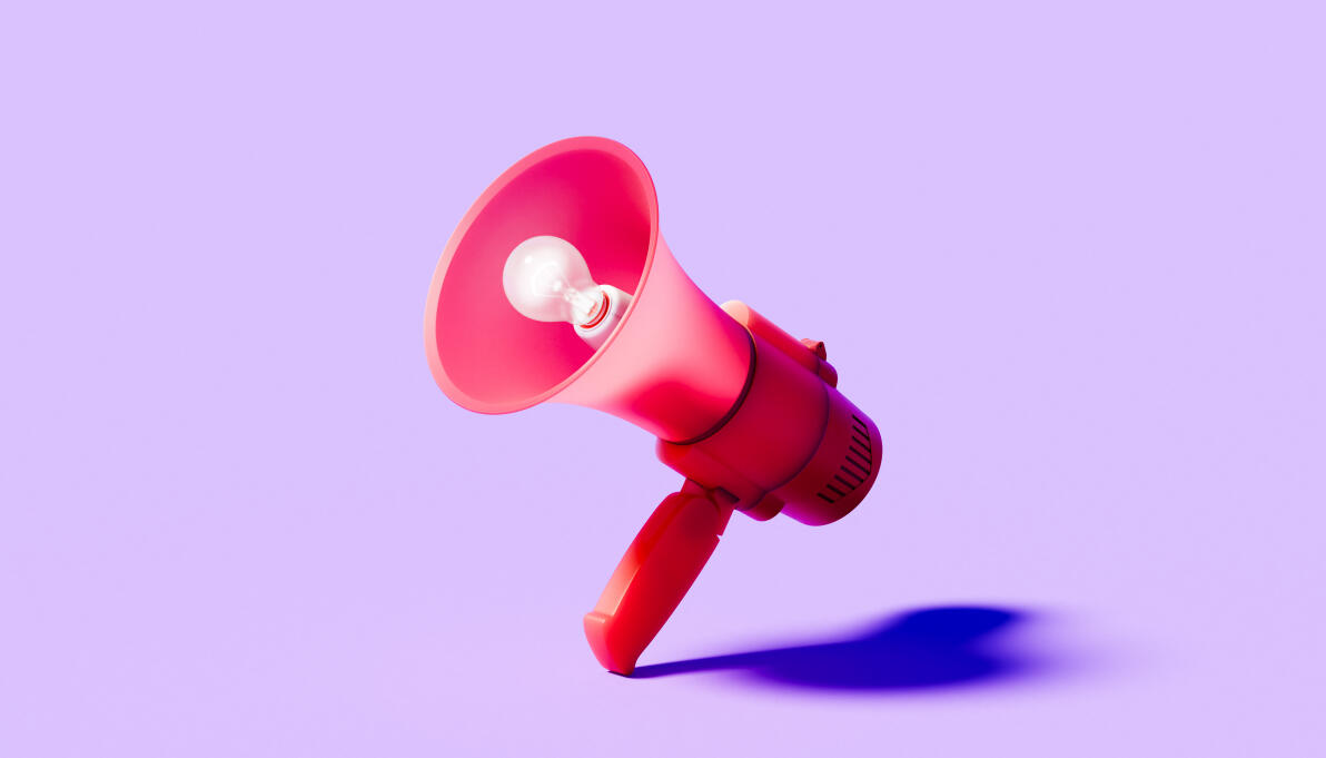 Conceptual image of a vibrant red megaphone with a bright white glowing light bulb positioned inside the speaker cone against a solid vibrant purple background in a clean studio setting. This stylized 3D rendered conceptual artwork captures the essence of boldly amplifying creative ideas innovation and inspiration through powerful communication in the era of artificial intelligence. The striking red megaphone and radiant bulb generate strong visual energy and an atmospheric mood of urgency leadership and motivational broadcasting while the purple backdrop provides dramatic contrast and copy space. The high-quality digitally generated details with sharp focus and glowing effects emphasize the transformative power of spreading generative AI concepts and breakthrough thinking across technology business marketing and education. The composition evokes feelings of achievement positive emotion and the ability of one bright idea to reach and inspire many in a modern futuristic abstract style.