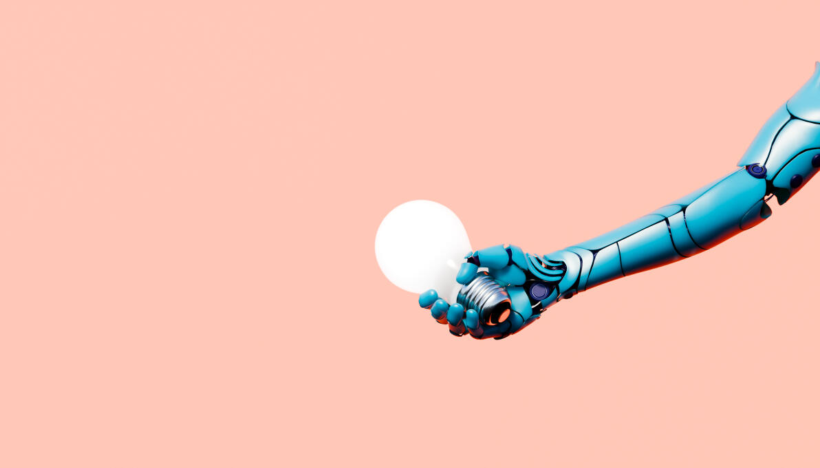 Conceptual image of a detailed blue robotic arm and hand firmly holding a brightly glowing white light bulb against a solid soft peach background in a minimalist studio setting. This stylized 3D rendered conceptual artwork represents artificial intelligence extending and presenting innovative ideas creativity and solutions to the world. The mechanical robotic arm and radiant bulb produce elegant contrast and an atmospheric mood of partnership trust and forward-looking potential while the warm peach backdrop enhances simplicity and copy space. The high-quality digitally generated details with soft lighting emphasize the seamless blend of robotics with creative concepts the supportive role of machine learning and the delivery of new beginnings and achievement. Perfect for themes of technological assistance AI collaboration creative problem solving and positive advancement in science business and design in a modern abstract realistic style.