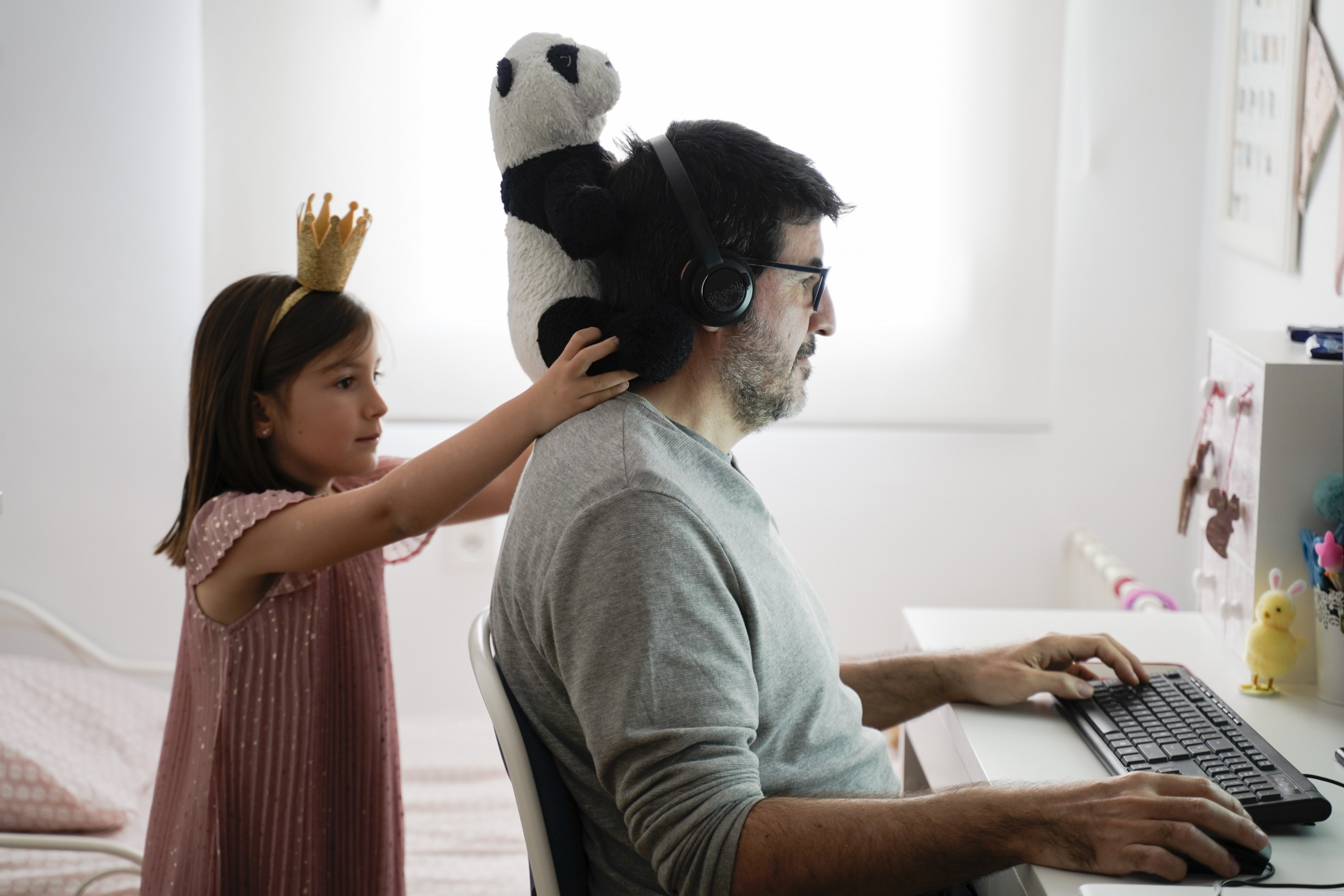 Man doing telework and reconciling family life