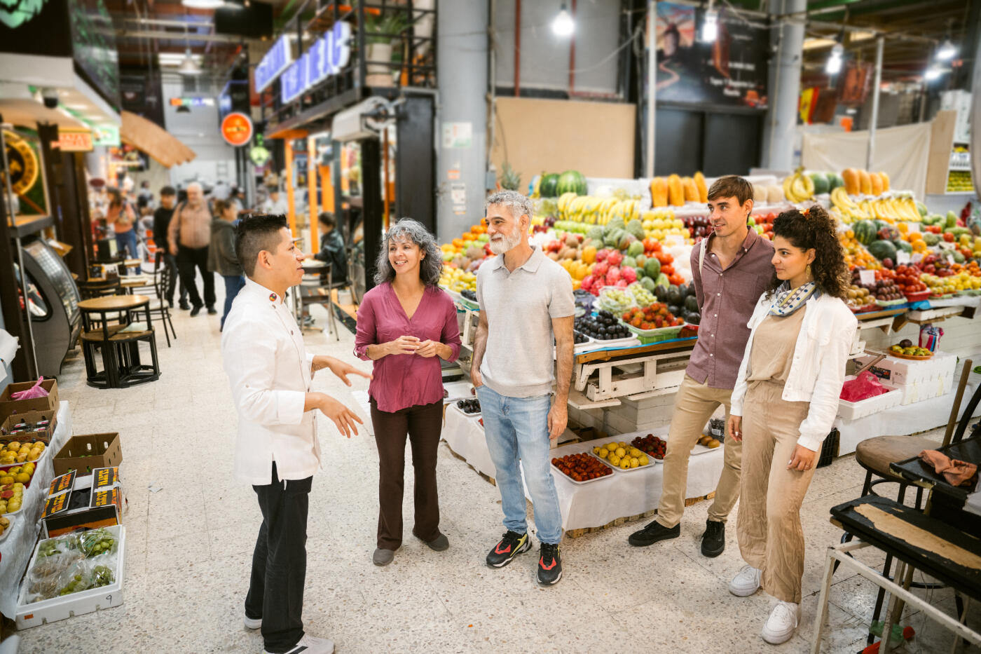 Chef leading a culinary tour to a Mexican Market