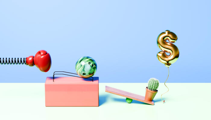 Rube Goldberg Chain Reaction Representing Economic Risk and Market Fragility