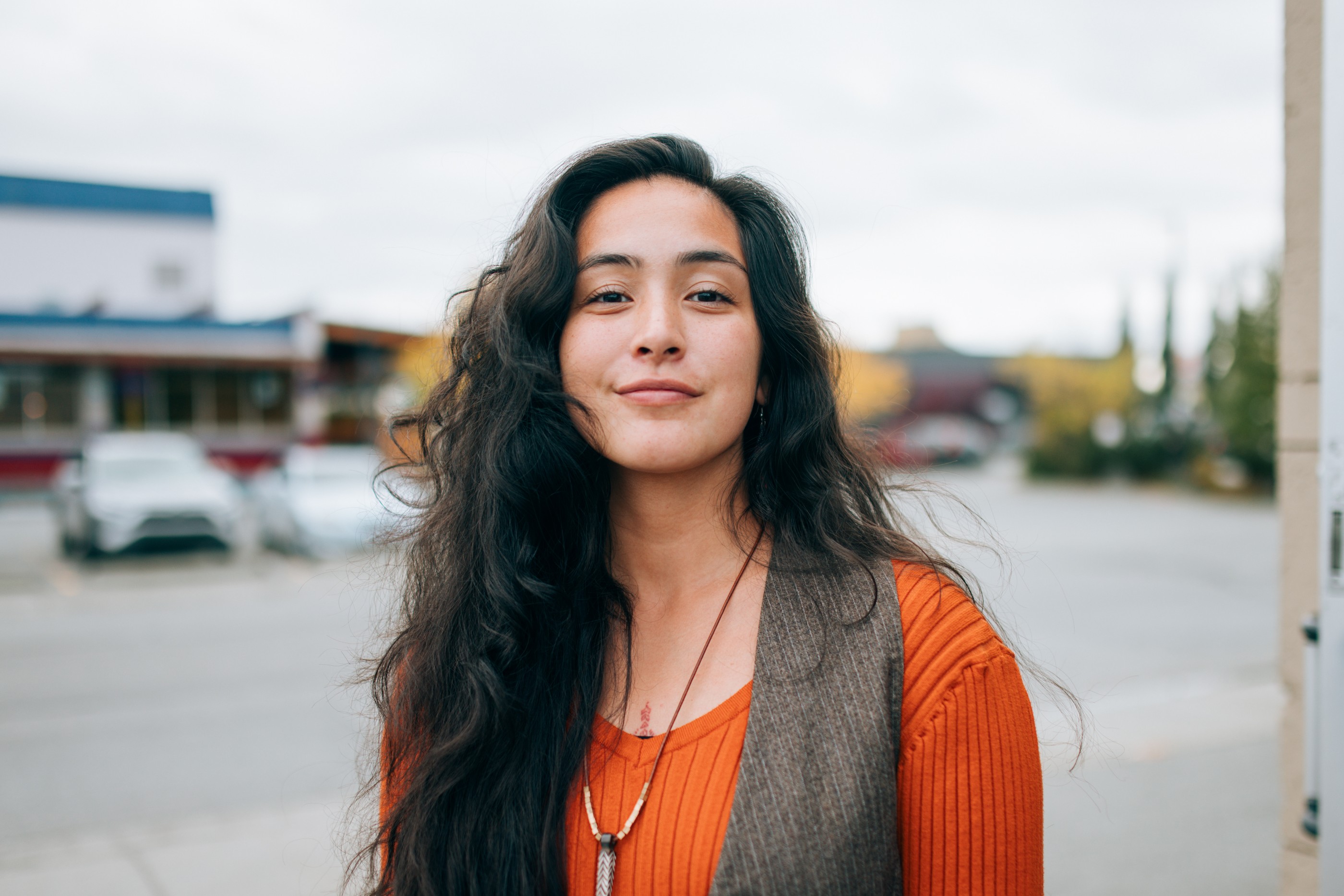 A portrait of a beautiful Indigenous North American woman in the city of Anchorage, Alaska.