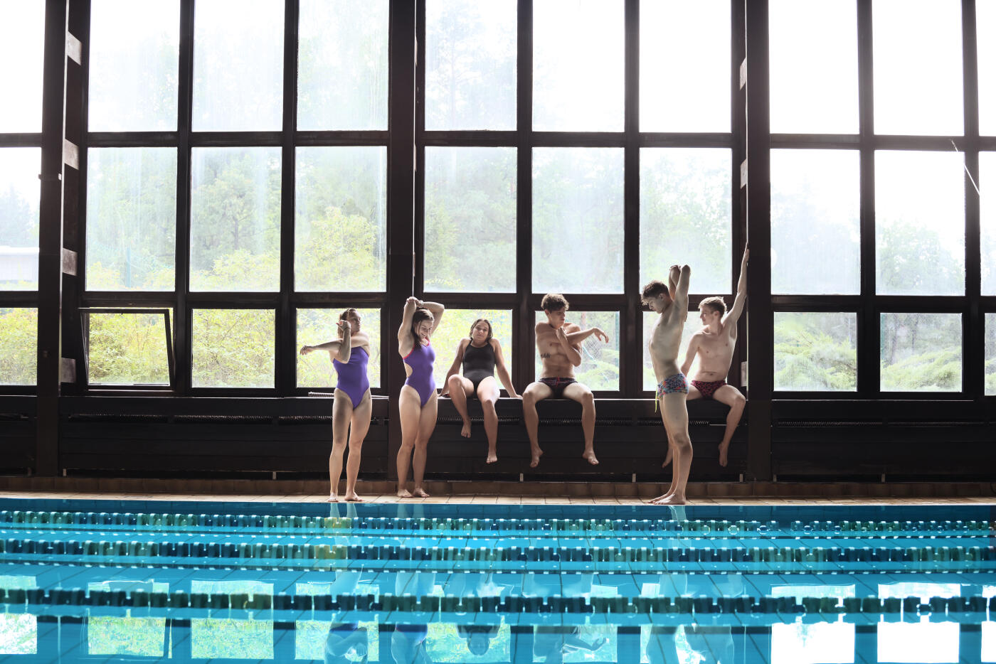 Competitive Pentathletes during their swimming team training. Swimming is one of 5 sports disciplines of the Modern Pentathlon (Fencing, Swimming, Running, Shooting, Obstacle Racing). Part of a series, athletes shown training for each sport.