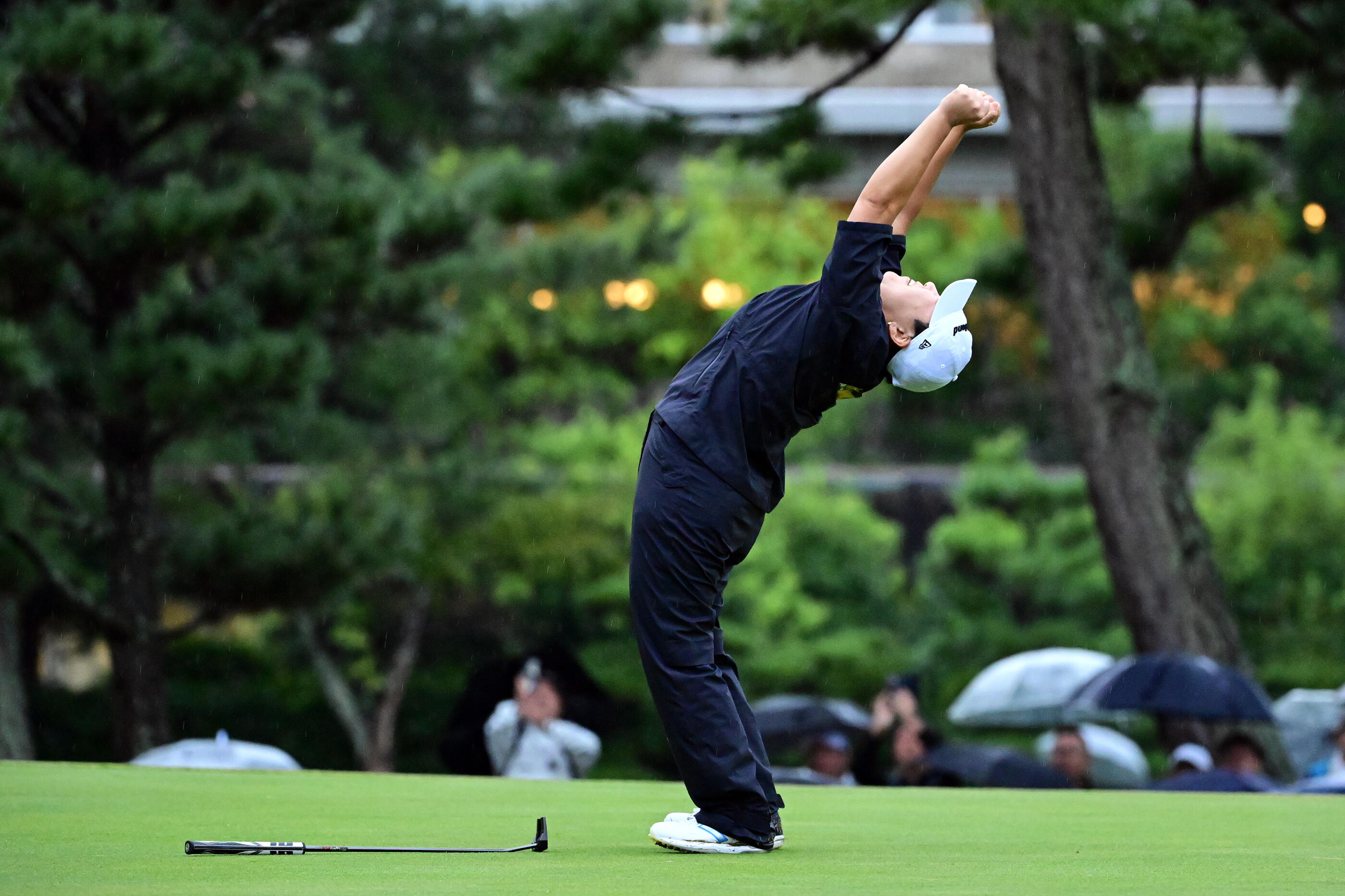 TAKARAZUKA, JAPAN - OCTOBER 04: (EDITORIAL USE ONLY) Jiyai Shin of South Korea celebrates after sinking the winning putt in the playoff to win the title during the final round of Japan Women's Open Golf Championship at Takarazuka Golf Club Old Course on October 04, 2026 in Takarazuka, Hyogo, Japan. (Photo by Atsushi Tomura/Getty Images)