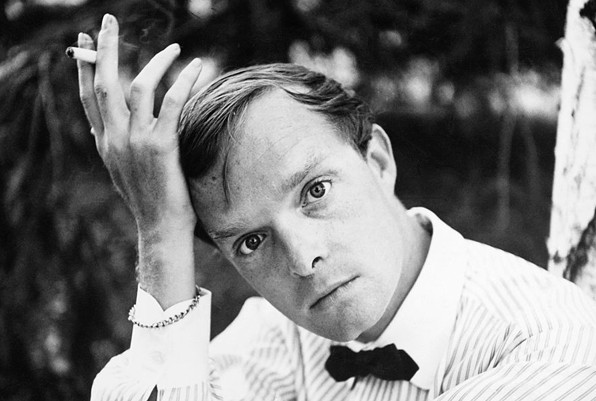 Author Truman Capote Posing Outdoors with Cigarette
