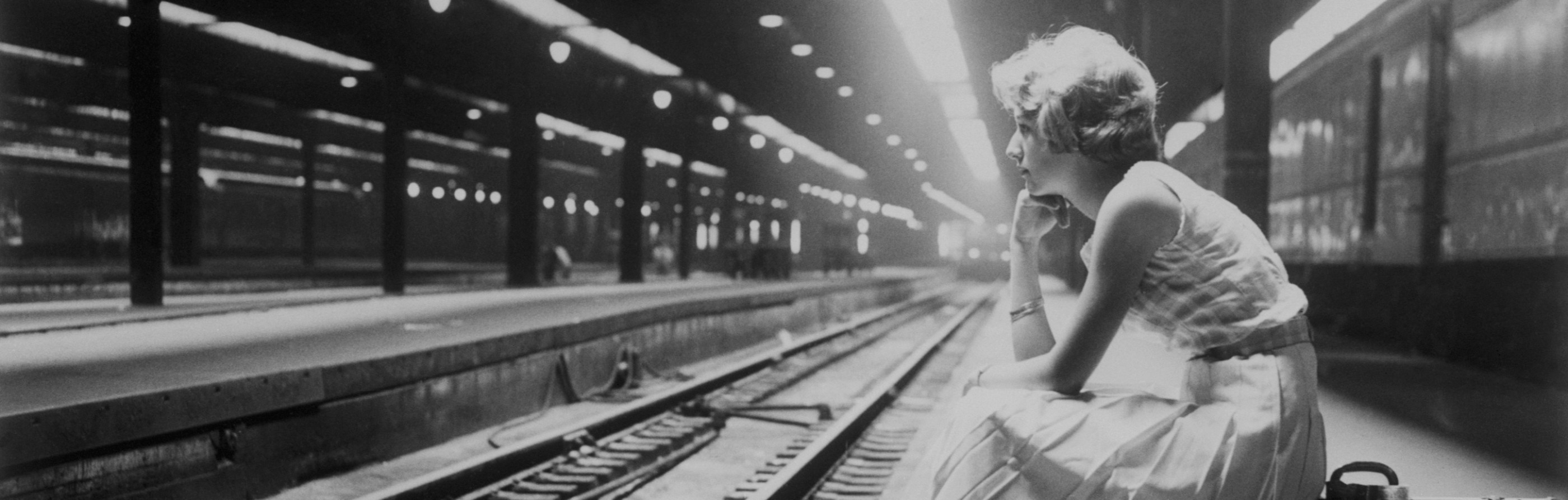 Teenage Girl Waiting for Train