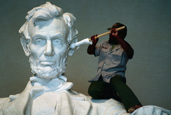 Workman Cleaning Ear of Lincoln by Daniel Chester French in the Lincoln Memorial